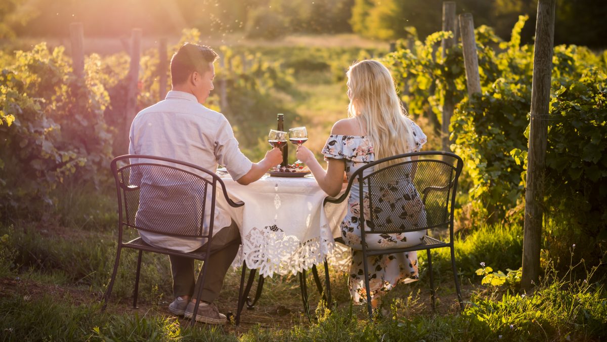 Romantic dinner with wine tasting in a place at sunset